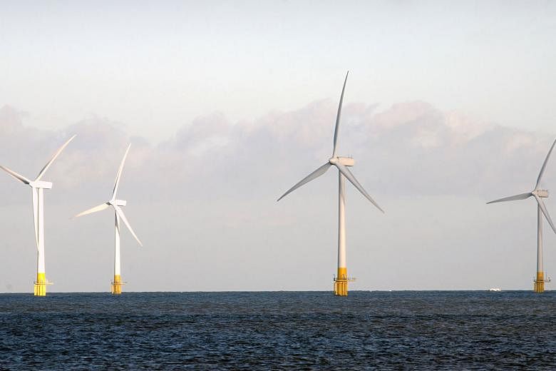 Wind turbines stand off-shore at Scroby Sands, Great Yarmouth in Norfolk, England. Britain's geographic location and strong wind conditions make it a prime candidate for hosting wind farms. The upcoming Hornsea Project One will be built 120km off the coas