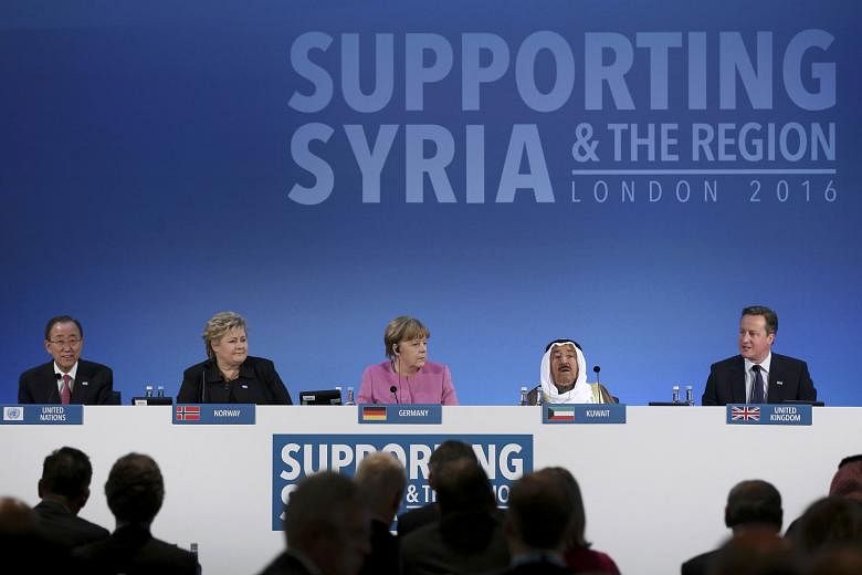(From left) UN chief Ban Ki Moon, Norwegian Prime Minister Erna Solberg, German Chancellor Angela Merkel and the Emir of Kuwait, Sheikh Sabah al-Ahmad al-Sabah, listening as British Prime Minister David Cameron spoke at the donor conference in London yest
