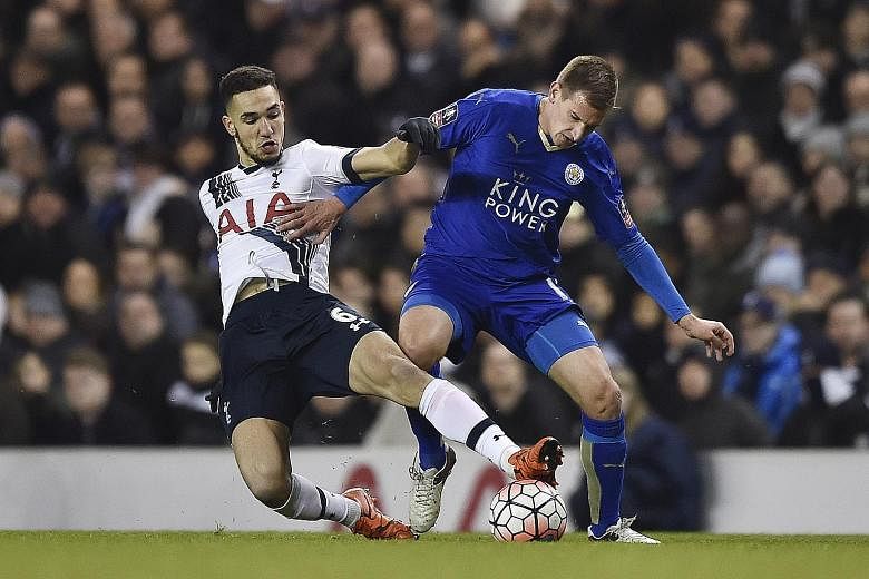 Leicester City's Marc Albrighton (right) holds off a tackle from Tottenham Hotspur's Nabil Bentaleb. With 13 more rounds to go this season, league leaders Leicester will do their utmost to continue to hold off any challenges from the teams below them