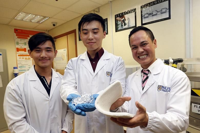 The NUS team led by Dr Duong (right) has converted paper waste into a novel material that could be used for oil spill clean-ups, heat insulation and packaging. The material will hit the market in May. With Dr Duong are (from left) mechanical engineering s
