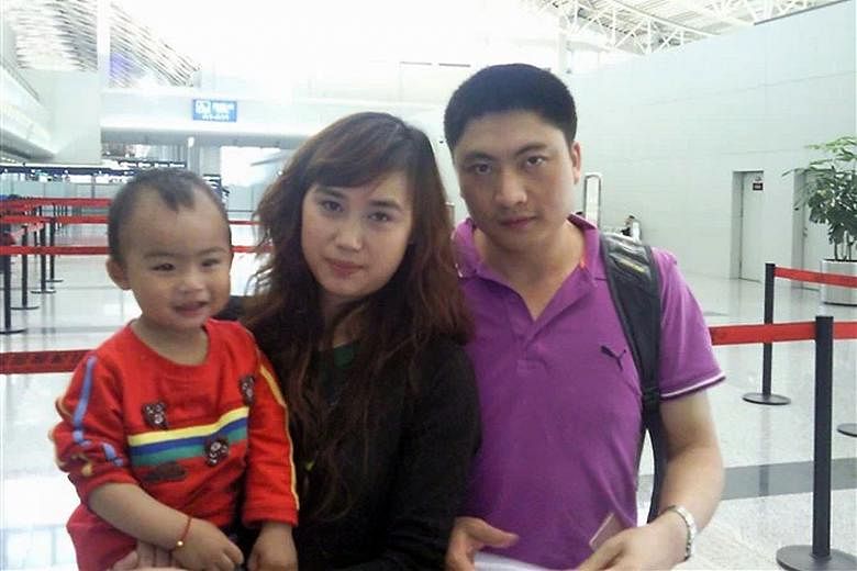 A photo of Mr Gu, Madam Kong and their older son taken around six years ago when Mr Gu returned to China. Their two sons are now aged four and seven.