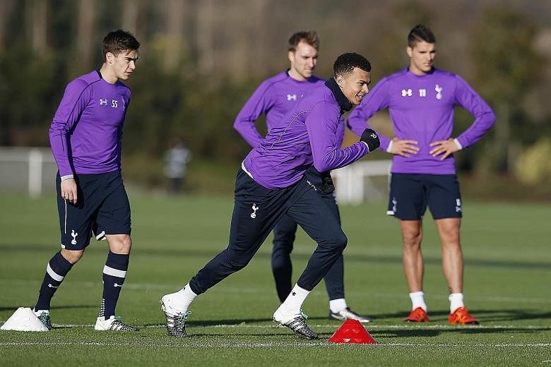 Dele Alli and his Tottenham Hotspur team-mates being made to work their socks off during one of manager Mauricio Pochettino's hugely demanding training sessions at the club's Enfield training ground. The outstanding form of the teenager has been a hi