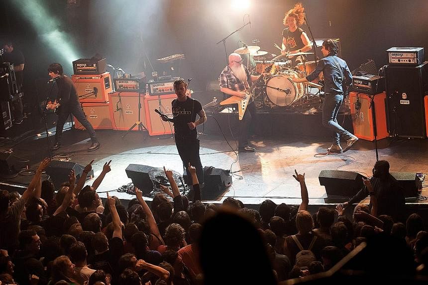 Eagles Of Death Metal (above) performing on Nov 13 last year at Bataclan theatre in Paris, moments before gunmen stormed inside and killed 90 of the people in the audience. Frontman Jesse Hughes, who performed with the band in Stockholm last Saturday, sai