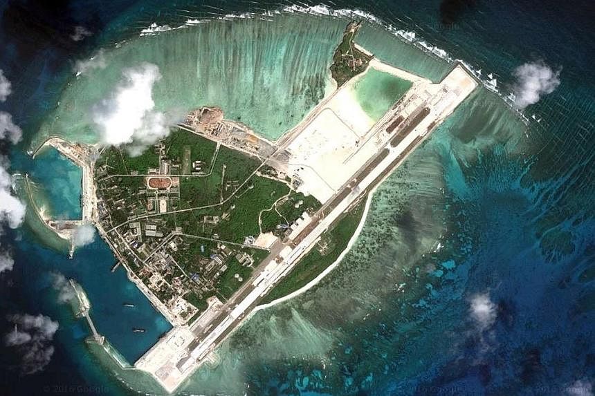 An earlier satellite image of the China-controlled Woody Island, which is part of the Paracel chain also claimed by Taiwan and Vietnam. The reported missile deployment drew swift condemnation, but China's Foreign Minister said Beijing was entitled to