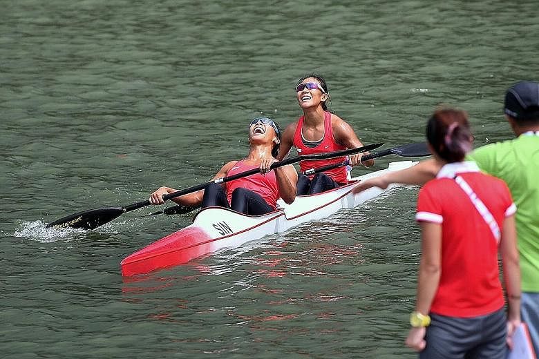 Singapore's Stephenie Chen (left) and Suzanne Seah after winning the SEA Games K2-500m gold last year. Canoeing has been dropped from the shortlist of 34 sports for next year's Games, along with fencing, bodybuilding, judo and triathlon.