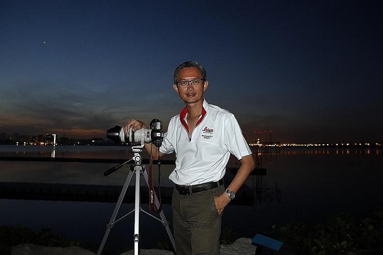 Mr Soh venturing to Pandan Reservoir in Jurong to try and snap photos of the five planets - Mercury, Venus, Saturn, Mars and Jupiter. The bright speck in the sky is Venus.