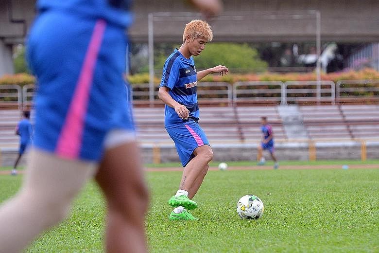Kento Fukuda training at Woodlands Stadium last week. Though Madhu Mohana is suspended, Fukuda expects the Warriors defence to keep Stags star Jermaine Pennant under control.
