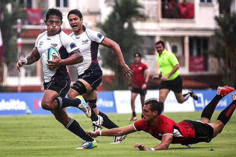 Max Ducourneau (in red) was part of the Singapore rugby sevens team that clinched bronze at last year's SEA Games. The team will be hoping to improve on that showing at the inaugural Southeast Asia 7s tournament in April.