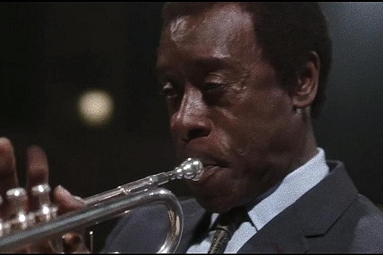 Don Cheadle learnt to play the trumpet for his role as jazz legend Miles Davis.