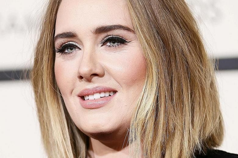 Singer Adele says she cried all day after she sang All I Ask off-key on the Grammys stage.
