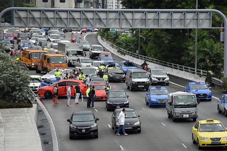 Six cars, a taxi, a lorry and a motorcycle were involved in a pile-up on the CTE towards the AYE, near the Cairnhill exit, yesterday morning. It was one of at least 20 expressway accidents before 11am yesterday.