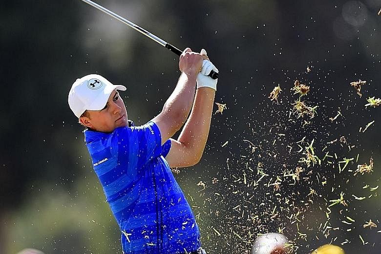 The world's No. 1 golfer Jordan Spieth hits out of the rough on the ninth hole during round one of the Northern Trust Open at Riviera Country Club in Pacific Palisades, California. The American fired the worst first round of his career - an eight-ove