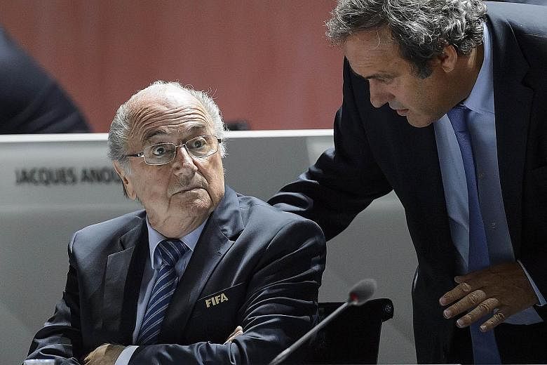 Sepp Blatter (left) claims that Michel Platini was pressured by then French president Nicolas Sarkozy to vote for Qatar, which the Frenchman has always denied.