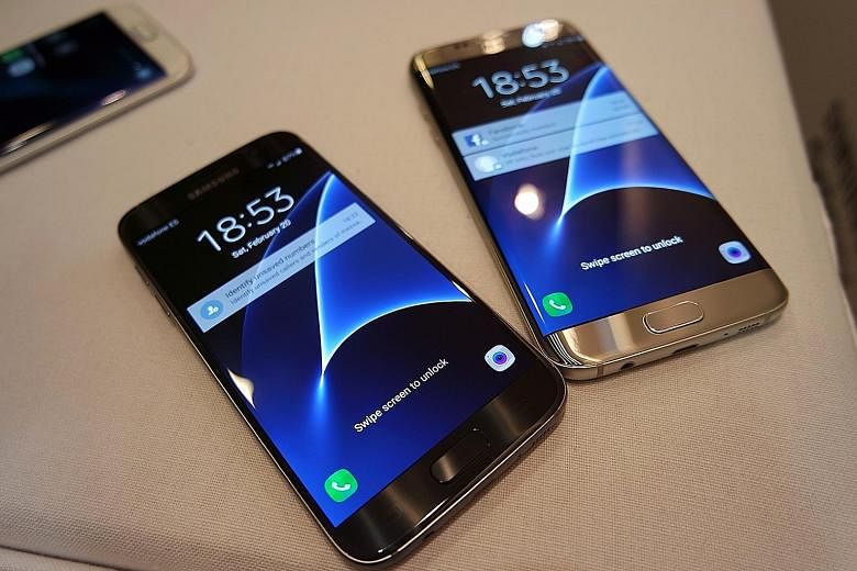 Samsung unveiled its new S7 (left) and S7 edge phones yesterday, a day before the Mobile World Congress in Barcelona, Spain.