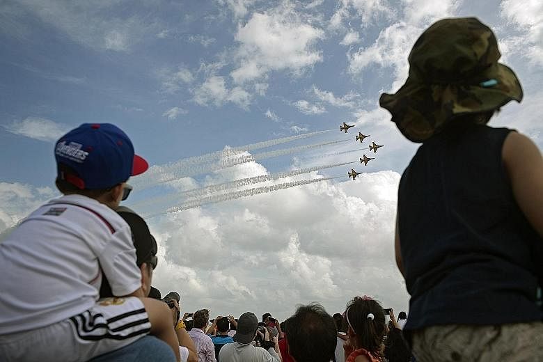 Visitors to the Singapore Airshow yesterday cheering and snapping photos as South Korea's Black Eagles aerobatic team soared to the skies with some heart-stopping aerial displays. The airshow, which ran from last Tuesday to yesterday, saw more than 1