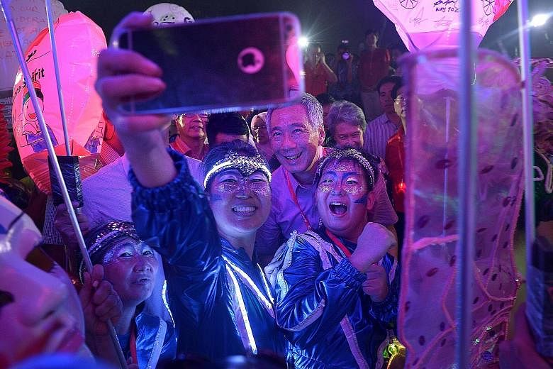 The Chingay festivities moved from downtown Singapore to the heartland last night as 2,000 performers entertained the crowds in Bishan-Ang Mo Kio Park. Prime Minister Lee Hsien Loong and Mrs Lee joined 50,000 people at the Chingay Night Fiesta, which