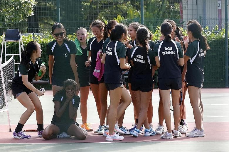Raffles Girls' School's B Division players celebrating after clinching the winning point in the final against Methodist Girls' School.