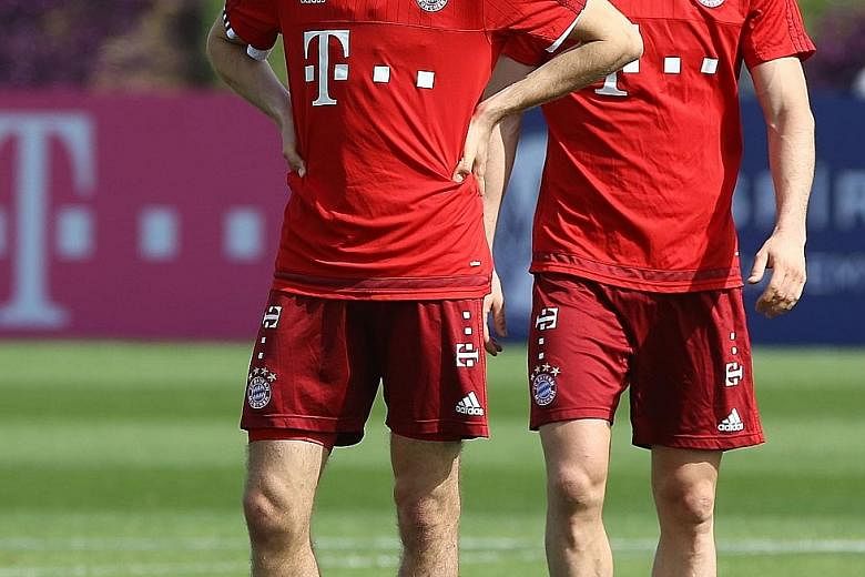 Bayern Munich's Thomas Mueller (left) and Robert Lewandowski have scored 56 goals in total in all competitions this season.