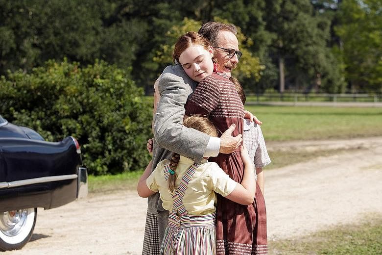 Actor Bryan Cranston (left, with actress Elle Fanning) is nominated for a Best Actor Oscar for his role in Trumbo. 