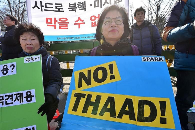 South Korean anti-war activists rallying in Seoul yesterday against talks between their country and the US on deploying the Terminal High Altitude Area Defence System.