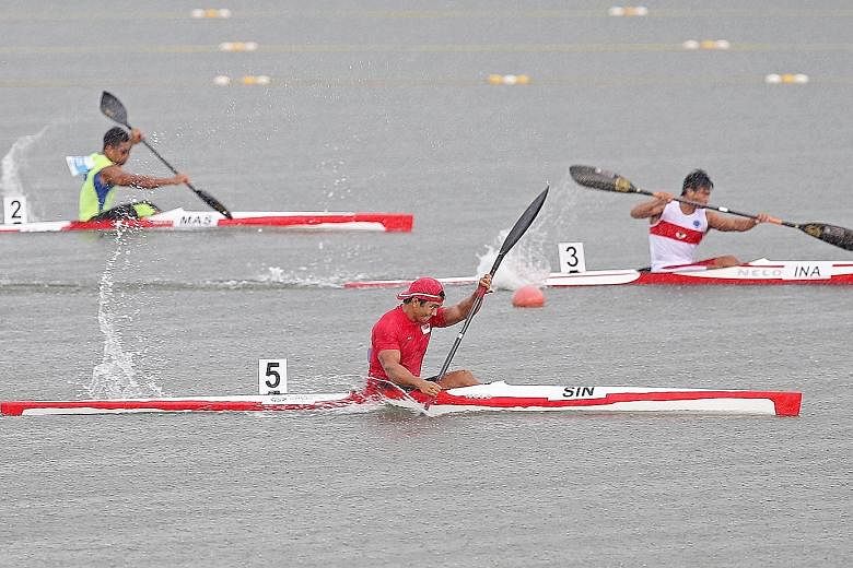 Singapore's Mervyn Toh (in red) competing in the canoeing finals at the SEA Games in the Republic last year.