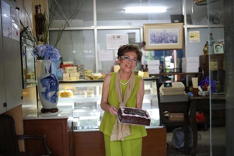 Mrs Violet Kwan with her rich and moist chocolate cake.