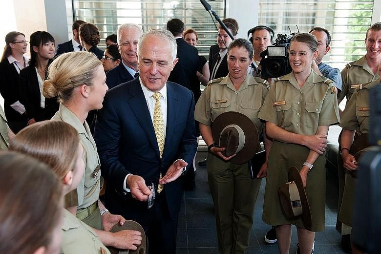 Mr Turnbull speaking to army cadets at the Australian Defence Force Academy in Canberra yesterday after the launch of the White Paper setting out greater spending on defence. He said Australia needed its military to be ready to protect its interests 
