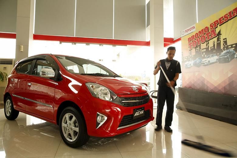 The group's main profit conbtributor - Astra International - which also runs this Toyota showroom in Jakarta, saw reduced profit contributions from all its major business segments