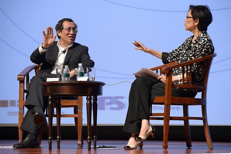 The writer, seen here with Ambassador-at- large Chan Heng Chee at an IPS-Nathan Lecture, says that despite apparent tensions, the US and China largely operate within the same frame of reference in working towards a stable modus vivendi.