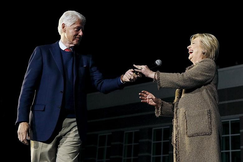 Former United States president Bill Clinton campaigning for his wife, Democratic presidential hopeful Hillary Clinton, as she rallied for support in Columbia, South Carolina, on Friday.