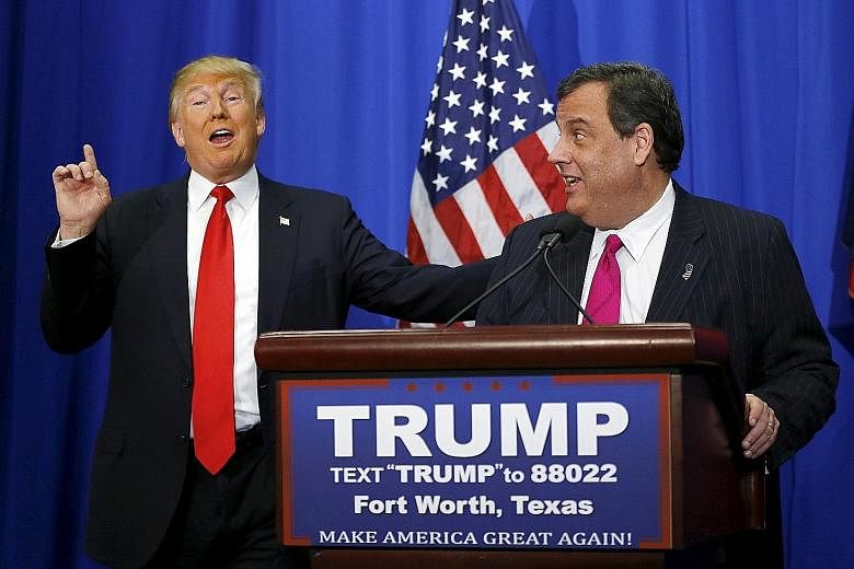 Mr Trump (left) speaking next to Mr Christie at a rally in Fort Worth, Texas, where Mr Christie endorsed the Republican front runner's presidential candidacy. Party elders expressed dismay, calling it a political marriage of expedience.