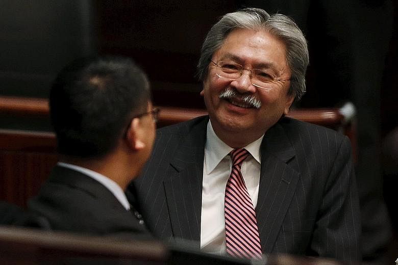 Mr Tsang before presenting the Budget on Wednesday. He announced plans to encourage the production of Cantonese films.
