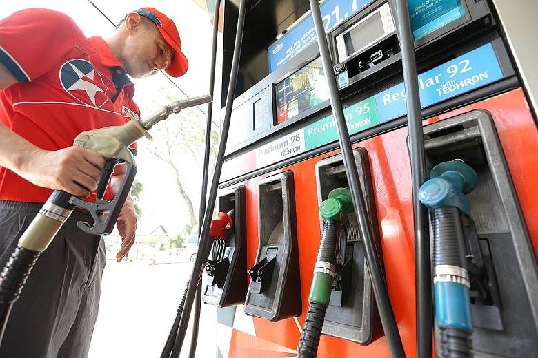 Responding to three MPs who asked why petrol pump prices had not fallen despite the plunge in crude oil prices, Dr Koh said in Parliament yesterday that this is because pricing decisions are based on refined wholesale petrol prices, not crude oil pri