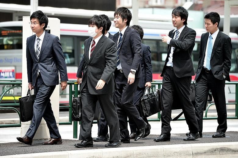 Japanese salarymen on their way to work in Tokyo. While Japan has achieved many things, including being the first Asian nation to attain First World status, its people remain kind and gracious. Its case shows that being competitive is not incompatibl