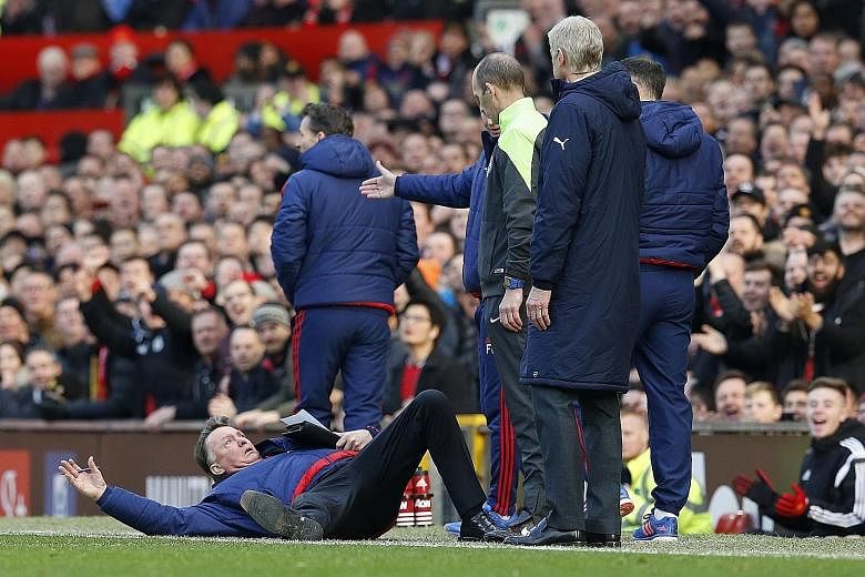 He's down but not out. United manager Louis van Gaal shows a rare theatrical streak while remonstrating with fourth official Mike Dean during the 3-2 victory against Arsenal on Sunday.
