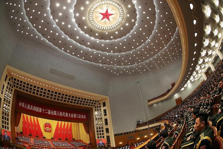 The opening of the 12th National People's Congress at the Great Hall of the People in Beijing last March. This year's NPC and CPPCC meetings come amid concerns over the economy, which faces slowing growth, overcapacity and volatile markets.