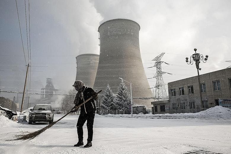 The cooling towers of a steel plant in Tonghua, Jilin province. The Chinese city's once-vaunted state-run steel mills have slipped inexorably into decline, weighed down by slumping global markets, a changing economy and the burden of costs and respon