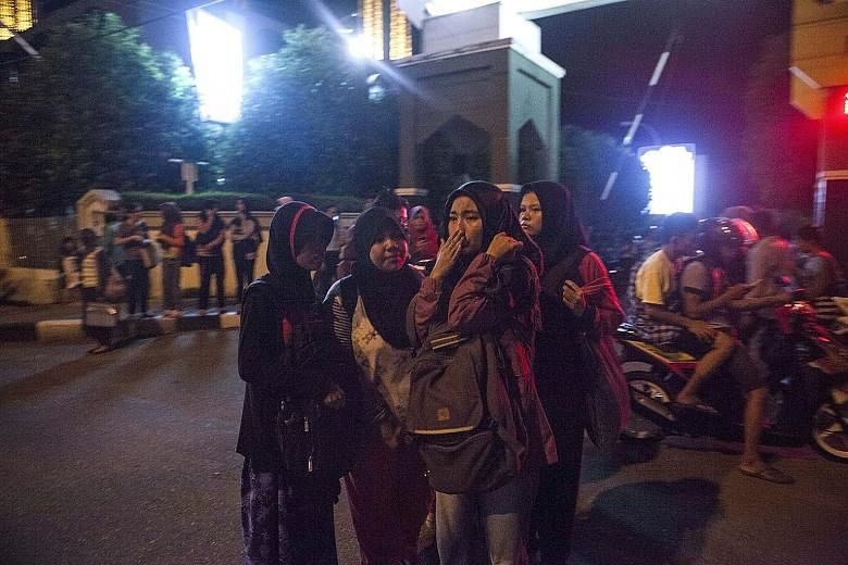Residents of Padang seeking safety in the streets after a strong earthquake shook the city in West Sumatra, Indonesia, last night. The magnitude-7.8 earthquake sparked panic, but there were no immediate reports of damage or casualties on Indonesia's 