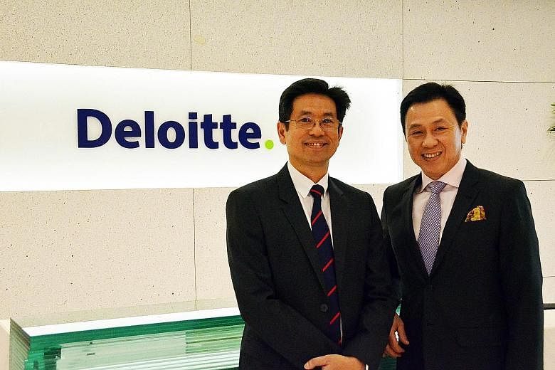 From left: Mr Yuen, now Deloitte Singapore chief executive, will succeed Mr Mah on June 1. The latter is retiring on May 31 after more than 38 years of service with the Big Four accounting firm.