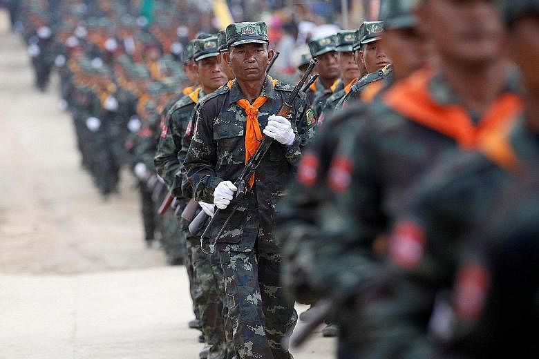 The question now is if the Myanmar military (above), guaranteed under the new Constitution to have 25 per cent of the seats in Parliament, will follow the example of the Indonesian generals and relinquish political privilege.