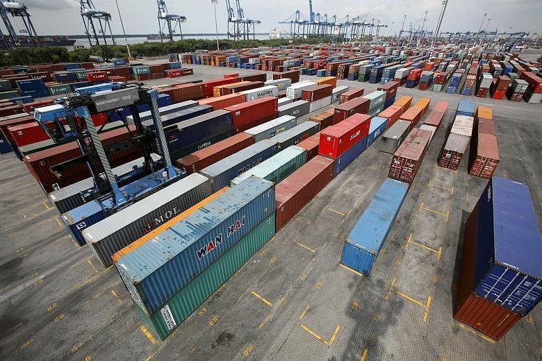 A container yard at North Port in Port Klang. January's trade surplus narrowed to RM5.39 billion (S$1.8 billion), pressured by falling oil and commodities prices as well as a strengthening ringgit in the first month of the year.
