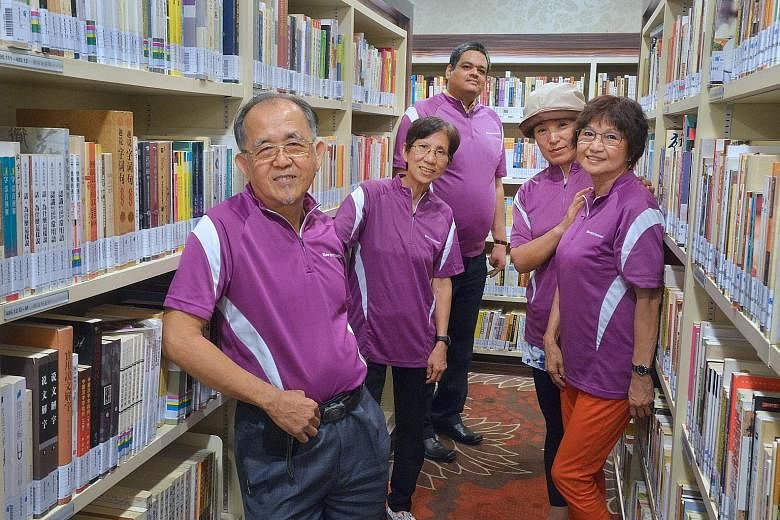 Volunteers at the library include (from left) Mr David Lim, Ms Chow Wai Ling, Mr Dhara Venkata Agoya Kumar, Madam Yang Jun and Madam June Tan. The library is on the fourth floor of Chinatown Point.