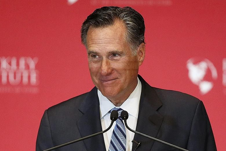 Former Republican presidential nominee Mitt Romney (above) called his party's front runner Donald Trump a "fraud" who would drive the US to the point of collapse.