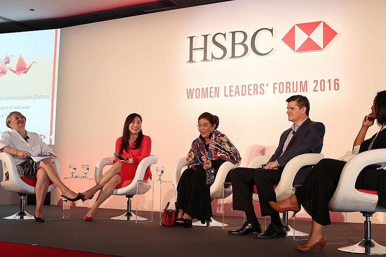 The speakers at yesterday's HSBC forum were (from left) Ms Laurel West, editorial director at The Economist Intelligence Unit; Ms Lynette Leong, CEO of CapitaLand Commercial Trust; Indonesia's Minister of Marine Affairs and Fisheries Susi Pudjiastuti