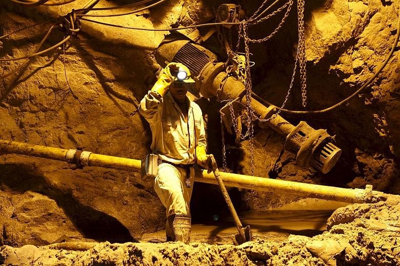 A miner at work in South Africa. Falling demand for natural resources in China has led to sharp declines in their prices, which have hit many developing and emerging economies in Latin America and Africa hard. Their worry is not just falling commodit