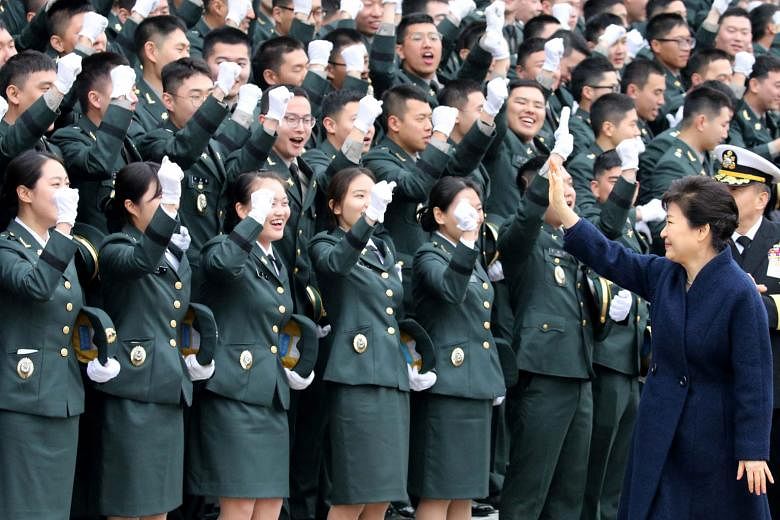 President Park Geun Hye at a military commissioning ceremony at South Korea's main military compound in Gyeryong. South Korea's Defence Ministry said Thaad will "contribute to the defence of South Korea from North Korea's increasing nuclear and missile th
