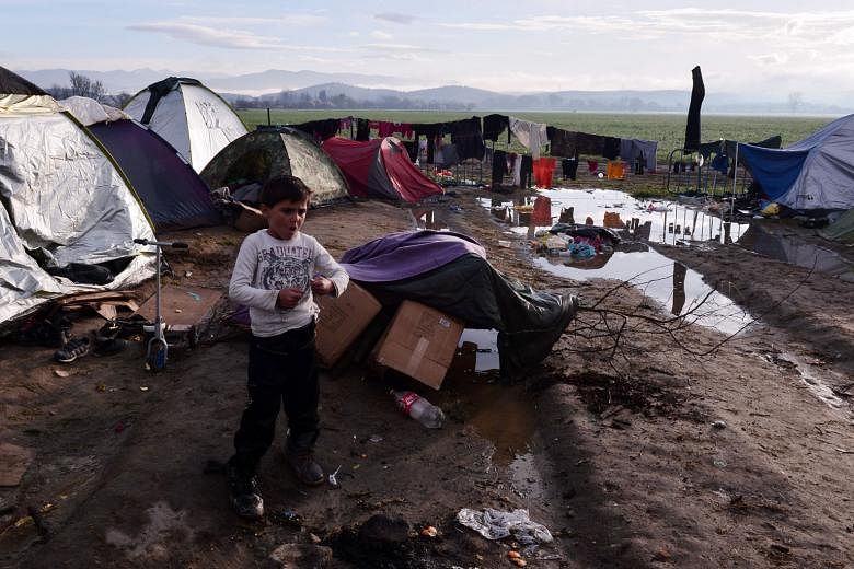 The misery in camps along the Greek-Macedonian border worsened yesterday after a night of driving rain. Conditions are particularly bad at the Idomeni crossing where 12,000 are stranded after Austria and the Balkan states imposed an entry cap. 