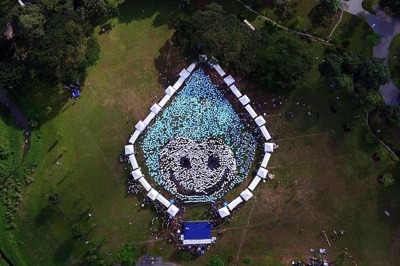 Aerial view of Water Wally, the mascot of national water agency PUB, at the launch of the Singapore World Water Day celebrations at Kallang River @ Bishan-Ang Mo Kio Park yesterday.