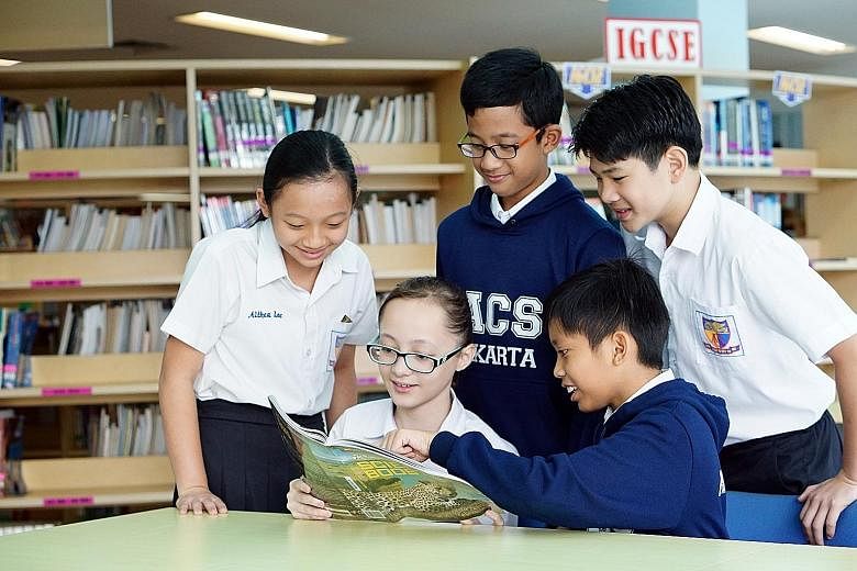 Grade 6 pupils at Anglo-Chinese School (International) Jakarta use Singapore textbooks for subjects such as science. Across Asia, such "Singapore- styled" institutions have been growing over the years.