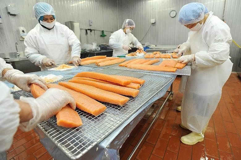 A smoked salmon production area at Fassler Gourmet. The seafood manufacturer is part of the group - comprising members from the private and public sectors - working on the guidelines on how ready-to-eat raw fish should be handled and prepared.